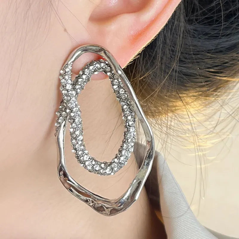 silver hoops, statement earrings, modern jewelery,  silver crystal earrings, Silver pavé crystal double-oval statement earrings with modern sculptural design, gold-tone option available, hypoallergenic and nickel-free, USA women’s jewelry.