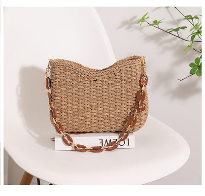 straw bag for beach day, Women's straw bag with natural fiber weave and curved structured silhouette, a stylish straw shoulder bag ideal for straw bag for summer outfits and seaside chic bag styling.