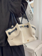 Load image into Gallery viewer, structured canvas tote bag, office canvas bag women, Minimalist structured canvas tote bag women, boardroom-ready belted style with gold hardware, capsule wardrobe essential for workwear outfits.