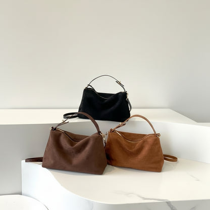 suede shoulder bag, convertible crossbody bag, v, Suede shoulder hobo, roomy slouchy silhouette, removable strap for crossbody wear, commuter work bag for women, travel tote, neutral fall handbag, old money style, suede tote bag, suede soft tote bag, quiet luxury everyday handbag.