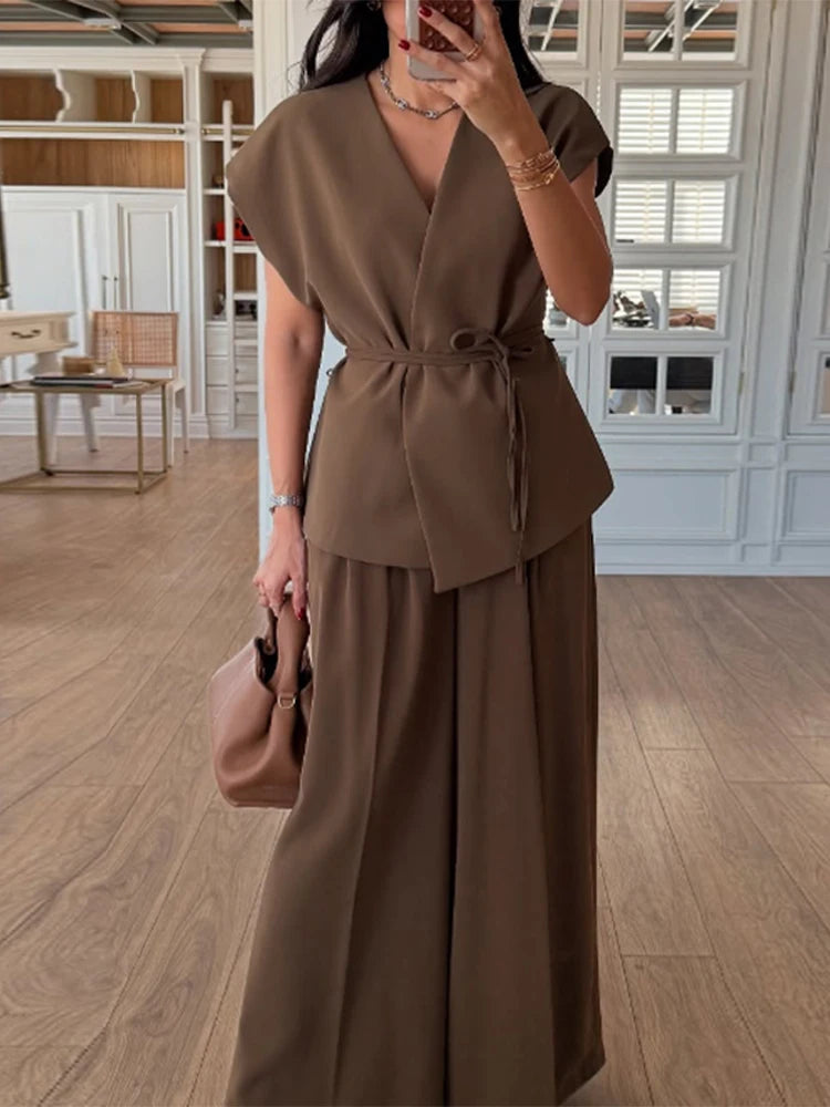 co-ord sets for women formal, Tailored pants set women in rich brown, power suiting women 2025 trend with wide leg trousers and wrap top, business casual pant set women look perfect for fall tailored suit set styling, winter office suit set for women, suit set women.