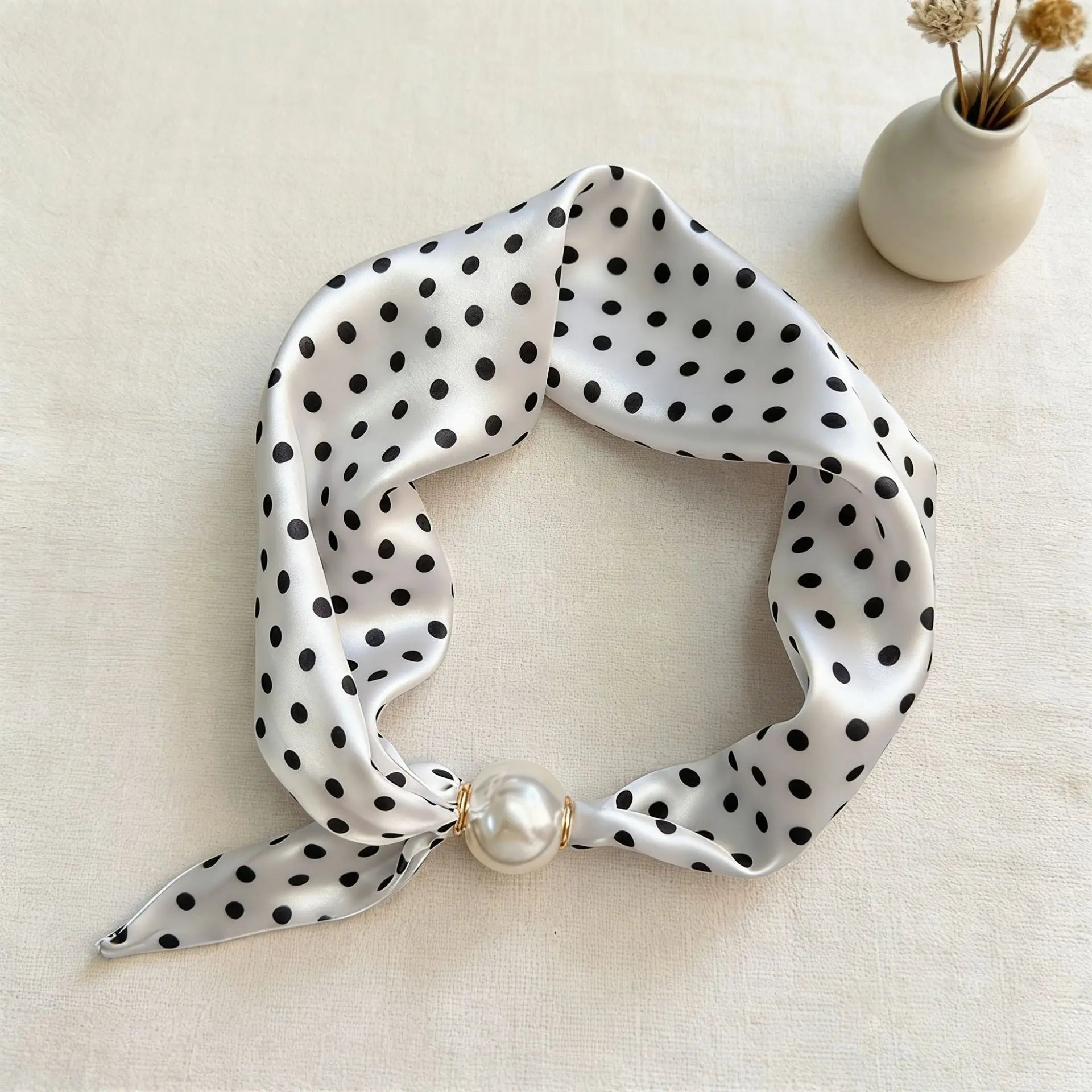 Women's printed faux silk scarf necklace with a magnetic pearl closure, lightweight silk-feel fabric, and decorative floral print for refined everyday styling, gifting, and modern fashion wardrobes.
