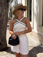 Load image into Gallery viewer, Minimalist white ribbed tank top with black trim, travel-ready and perfect for summer-to-fall layering. layering tank top, white ribbed tank top, halter tank top.