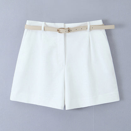 white tailored shorts, shorts with belt, belted shorts, office shorts, ladies tailored shorts, High-waisted wide-leg belted shorts for women, tailored high-waist pleated design, high-waist belted shorts, chic neutral outfit for summer travel, office wear, and effortless brunch styling.