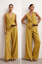 Load image into Gallery viewer, sleeveless vest set, wide leg coord set, Mustard vest pants set women, wide leg coord set with sleeveless vest women design, business casual vest set for office, high waist wide leg pants, tailored coord set with gold buckle belt detail, mustard coord set, office coord set, belted trouser set