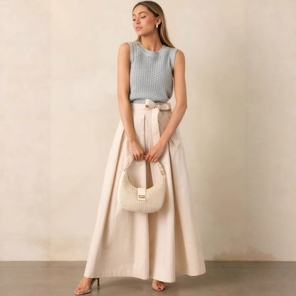 neutral outfit pants women, wide leg pants outfit business casual, High waisted cream wide leg trousers, soft structured texture with tie belt waist and pleated front detail, relaxed wide leg silhouette, wide leg pants work outfit women, ideal for office wear styling, high waisted wide leg pants work outfit.