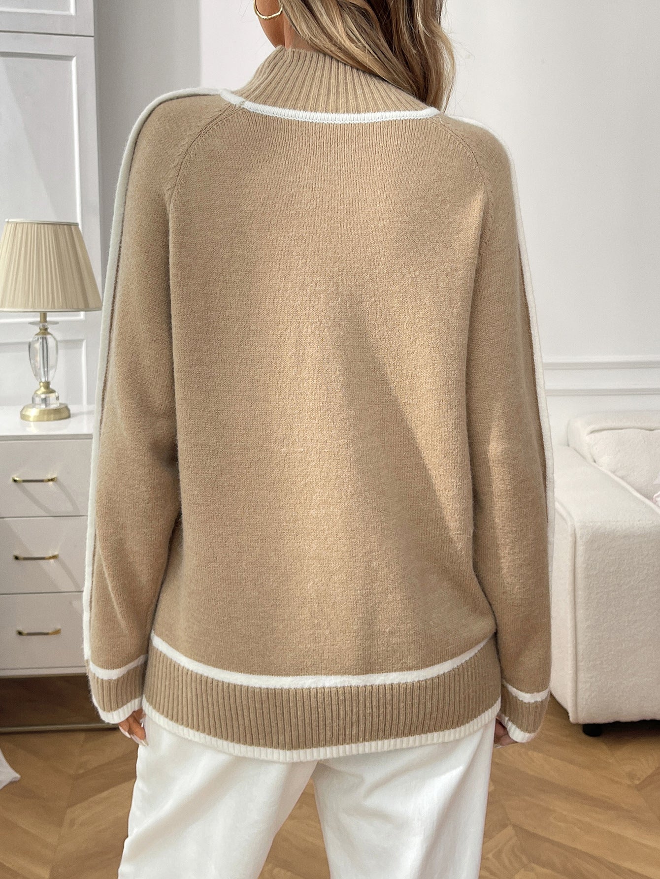 Cozy knit turtleneck sweater for women with contrast trim and modern piping detail, classy camel beige pullover for brunch, weddings, or business casual office outfits this fall.